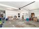 Spacious two-car garage featuring an automatic door opener, ample storage space, and plenty of room for parking and projects at 65 Macadamia Ct, Covington, GA 30016