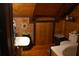 Bathroom featuring wood paneled walls, tub, and vanity at 6503 Old Macon Hwy, Rex, GA 30273