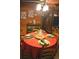 Cozy dining room with hardwood floors and a table set for a meal at 6503 Old Macon Hwy, Rex, GA 30273