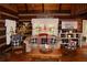 Welcoming living room features country decor, bright windows, and comfortable seating at 6503 Old Macon Hwy, Rex, GA 30273