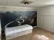 Serene bedroom featuring a mountain wall mural, natural lighting, and a full bed at 1379 Pair Sw Rd, Marietta, GA 30008