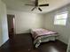 Bedroom with hardwood floors, ample natural light, and neutral walls, creating a calming space at 1379 Pair Sw Rd, Marietta, GA 30008