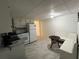 Efficient kitchen with appliances, white cabinets, and a cozy breakfast nook at 1379 Pair Sw Rd, Marietta, GA 30008