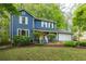 Beautiful two-story home with blue siding, white trim, and a well-manicured front lawn at 2317 Danielle Ct, Marietta, GA 30062
