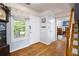 Home's foyer with hardwood floors, an ornate mirror, and a view into adjacent rooms at 2317 Danielle Ct, Marietta, GA 30062