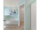 Stylish bathroom features a soaking tub and entry to a walk-in closet at 400 Brooch Way, Stockbridge, GA 30281