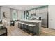 Modern kitchen with stainless steel appliances, a large island, and ample seating at 400 Brooch Way, Stockbridge, GA 30281