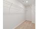 Walk-in closet ready for organizational touches at 400 Brooch Way, Stockbridge, GA 30281