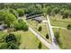 Spacious 1+ acre property showcasing the home's location amidst a lush, green landscape and neighboring roads at 220 Pitts Chapel Rd, Newborn, GA 30056