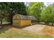 Backyard barn with double doors at 220 Pitts Chapel Rd, Newborn, GA 30056