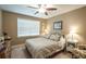 Cozy bedroom featuring a large window and comfortable furnishings at 220 Pitts Chapel Rd, Newborn, GA 30056