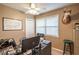 Dedicated office space, with ample lighting, a window, and lots of desk space at 220 Pitts Chapel Rd, Newborn, GA 30056