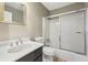 Cozy, carpeted bathroom with neutral color and combined bathtub and shower at 2667 Fieldstone Se Dr, Conyers, GA 30013