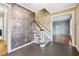 Charming entryway featuring stone flooring, stylish wallpaper, and access to the living room at 2667 Fieldstone Se Dr, Conyers, GA 30013