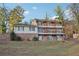Unique multi-story home featuring brick accents and multiple balconies offering ample outdoor space at 2667 Fieldstone Se Dr, Conyers, GA 30013