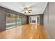 Elegant living room with hardwood floors, large sliding doors leading to the yard, and built-in shelving at 2667 Fieldstone Se Dr, Conyers, GA 30013