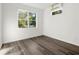 Cozy bedroom with hardwood floors, natural light, and air conditioning at 281 Griffin Nw St, Atlanta, GA 30314