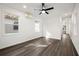 Spacious bedroom featuring hardwood floors, lots of natural light, and access to other areas of the home at 281 Griffin Nw St, Atlanta, GA 30314