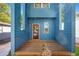 Inviting front porch showcasing the home's architectural detail and a warm welcome with its striking red door at 281 Griffin Nw St, Atlanta, GA 30314