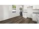 Bright kitchen features white cabinets and countertops, and stainless steel sink at 281 Griffin Nw St, Atlanta, GA 30314