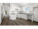 Well-lit, bright kitchen with white cabinets and modern fixtures providing ample counter space at 281 Griffin Nw St, Atlanta, GA 30314