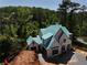 New construction home featuring Tyvek house wrap and beautiful wooded surroundings at 469 Emily Reed Ln, Atlanta, GA 30342