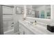 Elegant bathroom with white marble countertops, a sleek vanity, and a bathtub with a shower at 734 Frasier Se Cir, Marietta, GA 30060