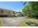 Exterior view showcasing a well-maintained backyard, including a patio area with stairway to the porch at 734 Frasier Se Cir, Marietta, GA 30060