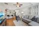 Inviting living room with hardwood floors and an open floorplan to the kitchen at 734 Frasier Se Cir, Marietta, GA 30060