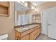 Bright bathroom with granite countertops, double sinks, and modern fixtures at 799 Hammond Dr # 314, Atlanta, GA 30328