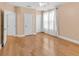 Bedroom with light beige walls, wood flooring, and multiple closets at 799 Hammond Dr # 314, Atlanta, GA 30328