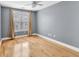 This bedroom features beautiful natural light and hardwood floors at 799 Hammond Dr # 314, Atlanta, GA 30328