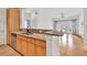 Well-lit kitchen featuring granite countertops, stainless steel appliances, and an island with sink at 799 Hammond Dr # 314, Atlanta, GA 30328