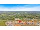 Aerial view of the community surrounded by lush green space and close proximity to amenities at 127 Laurel Farms Ln, Dallas, GA 30157
