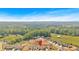 Aerial view showcasing community layout surrounded by trees at 127 Laurel Farms Ln, Dallas, GA 30157