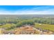 The aerial view highlights the community's location and the natural surroundings at 127 Laurel Farms Ln, Dallas, GA 30157