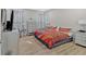Comfortable bedroom with hardwood floors, closet, and lots of natural light at 127 Laurel Farms Ln, Dallas, GA 30157