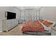 Comfortable bedroom with hardwood floors, closet, and lots of natural light at 127 Laurel Farms Ln, Dallas, GA 30157