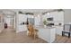 Bright, modern kitchen with granite countertops, stainless steel appliances, and a functional island at 127 Laurel Farms Ln, Dallas, GA 30157