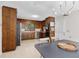 Functional kitchen featuring wood cabinets, stainless steel appliances, and neutral countertops at 1391 Arden Sw Dr, Marietta, GA 30008