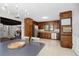 Charming kitchen with wood cabinets, stainless steel appliances, and a view into the living room at 1391 Arden Sw Dr, Marietta, GA 30008