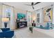 Cozy living room with modern furniture, stylish decor, and an inviting fireplace at 8214 Tiger Way, Riverdale, GA 30296