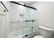 Elegant bathroom with tiled shower and modern toilet at 113 Courtyard Ter, Roswell, GA 30075