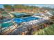 Aerial view of community amenities including pool, tennis courts and playground at 1584 Fernstone Nw Cir, Acworth, GA 30101
