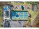 Aerial view of community pool, tennis courts, playground, and basketball court at 1584 Fernstone Nw Cir, Acworth, GA 30101
