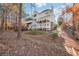 Backyard with multilevel deck, screened-in porch and rock landscaping at 1584 Fernstone Nw Cir, Acworth, GA 30101