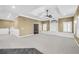 Large basement features neutral paint, white trim, and ceiling fan at 1584 Fernstone Nw Cir, Acworth, GA 30101