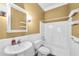 Bathroom with white cabinets, faucet, mirror, and tiled floor at 1584 Fernstone Nw Cir, Acworth, GA 30101