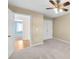 Bedroom featuring ceiling fan, closet, and a view into another room at 1584 Fernstone Nw Cir, Acworth, GA 30101