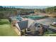 Aerial view of community building near pool and tennis courts at 1584 Fernstone Nw Cir, Acworth, GA 30101